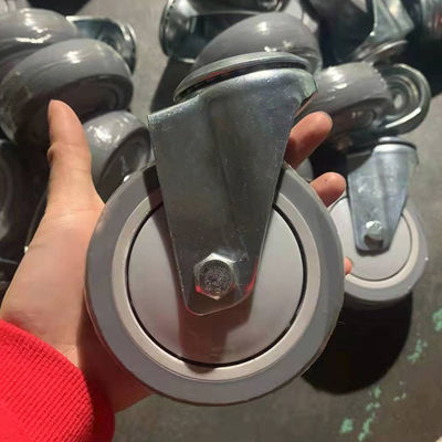China 4 Inch Grey Soft Trolley Wheels Silent TPR Hollow Kingpin Bolt Hole Swivel Casters For Shopping Carts