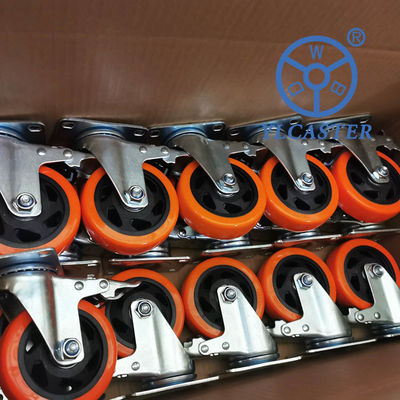 China 4 Inch Hollow Core Polyurethane Wheels Orange Black Wheel Swivel Locking Casters
